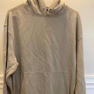 Men tan hoodie. In a size medium